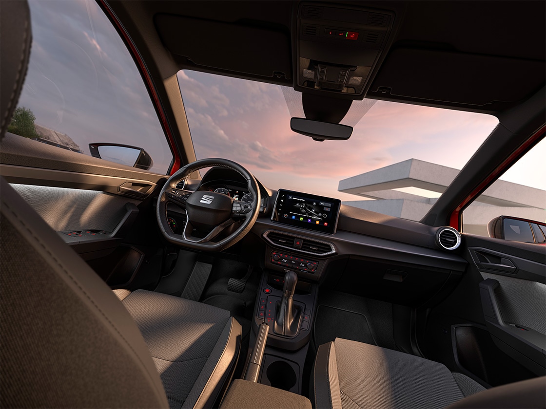 Interior view of the seat arona that showcases some design details, such as the steering wheel, the dashboard or part of the upholstery