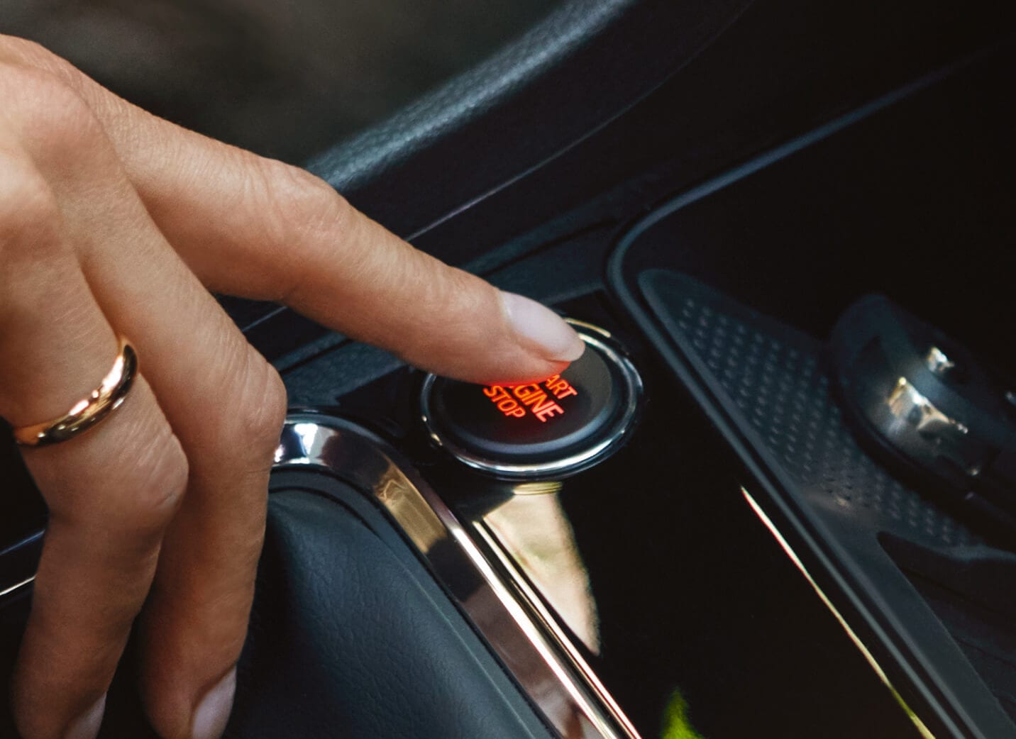 SEAT Ateca shows a man using the car SUV starter button