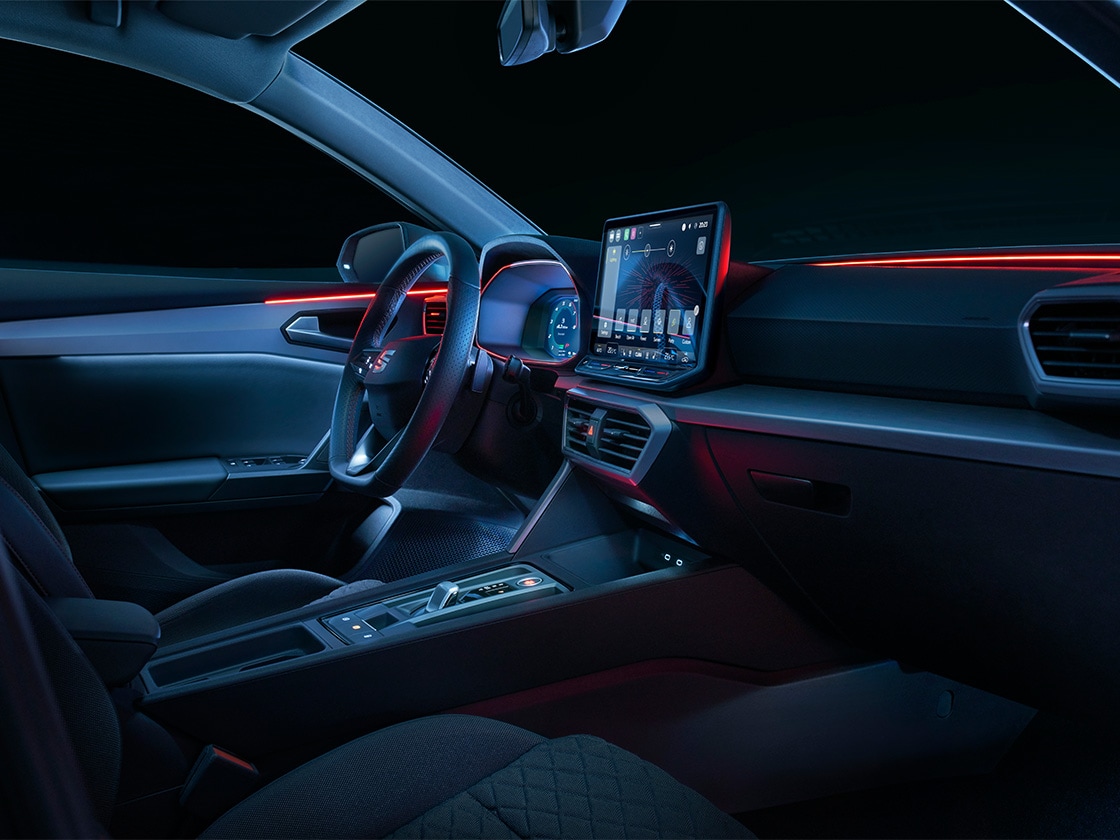 Wraparound led ambient lighting in the SEAT Leon hatchback, providing a cool design and safety features like alerts for open doors or blind spots.