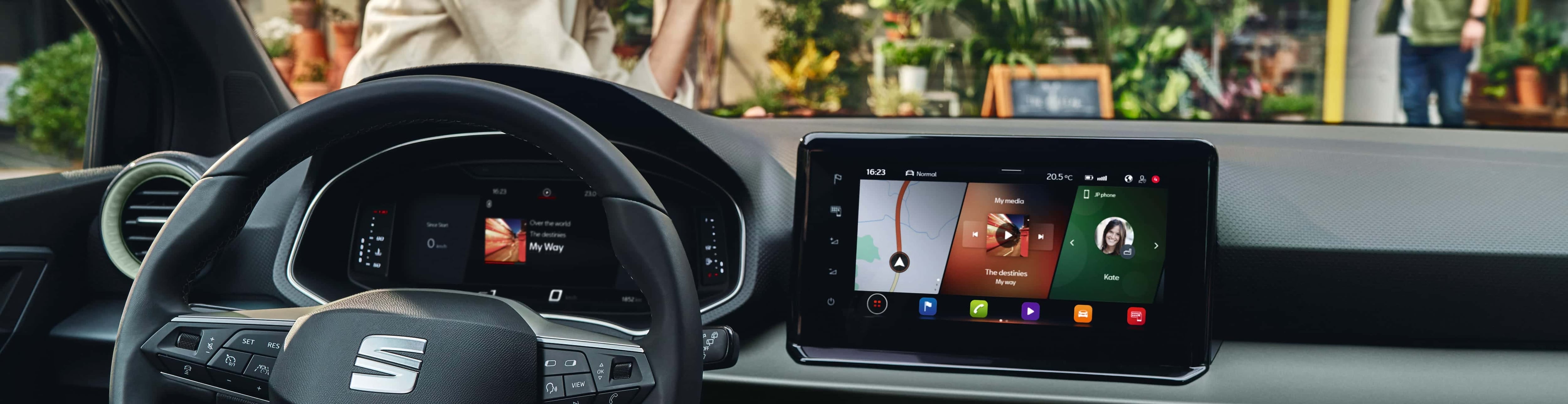 SEAT Arona interior view of the dashboard with the steering wheel and infotainment 