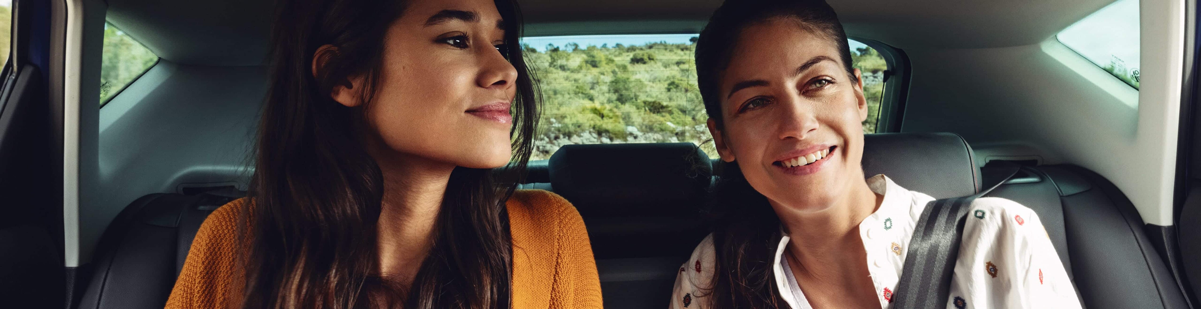 two women sitting inside the SEAT Arona